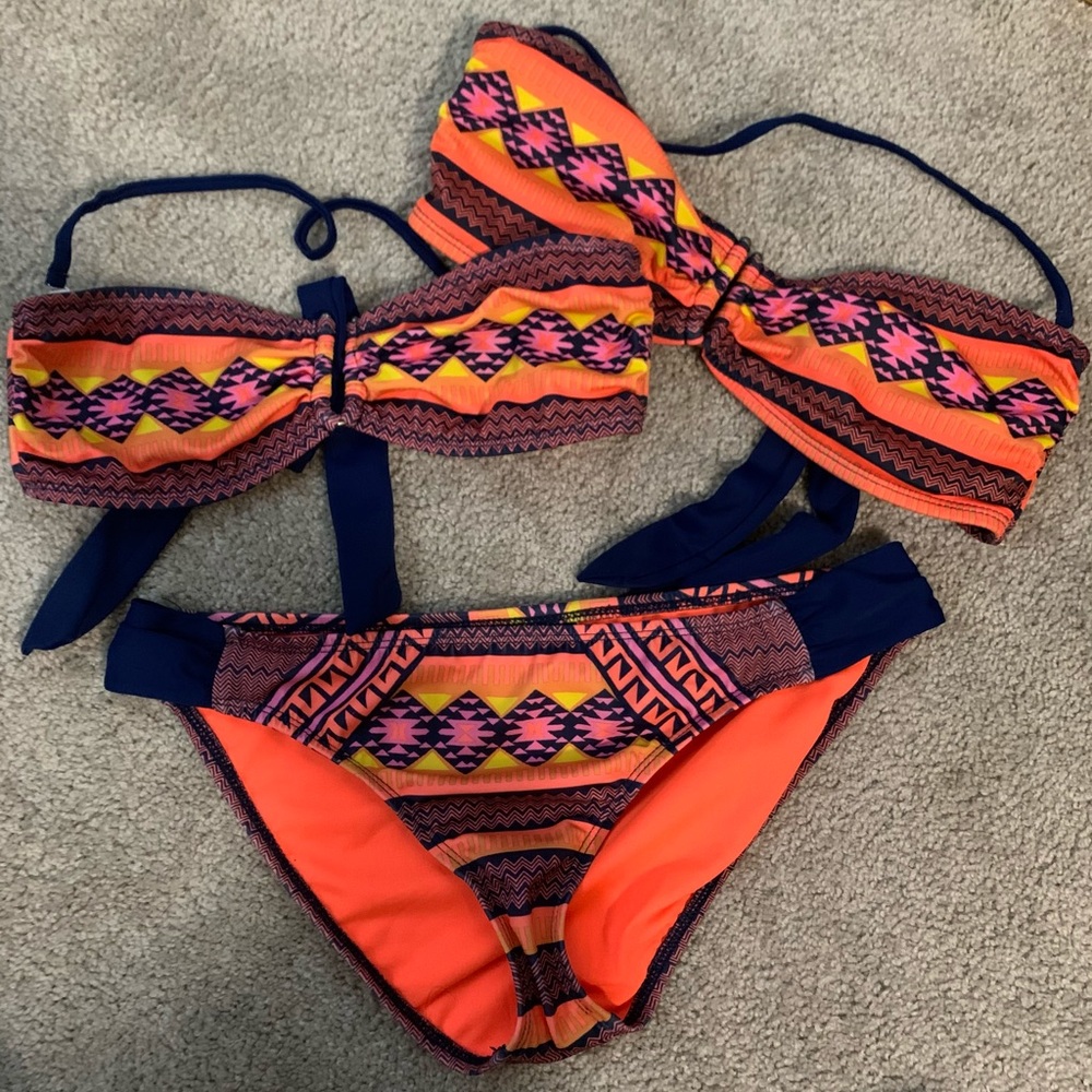 Hurley bikini with two tops.